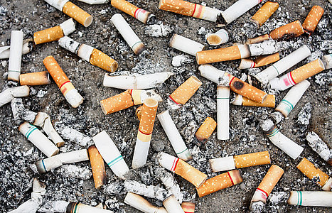 cigarette butts in ash tray