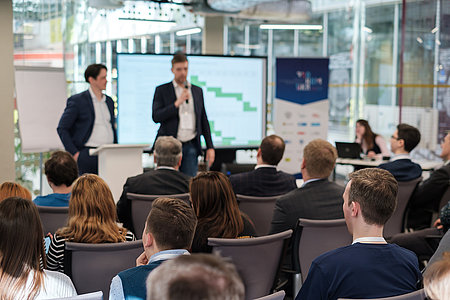 Audience listens lecturer at workshop